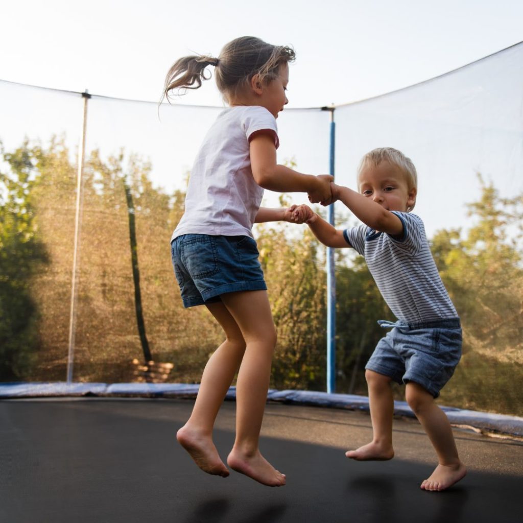 Kids jumping on trampoline