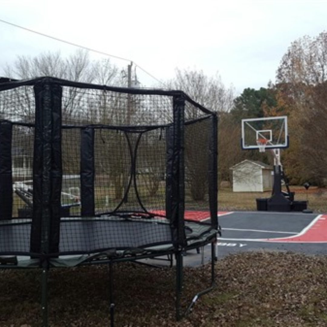 Basketball hoop and trampoline