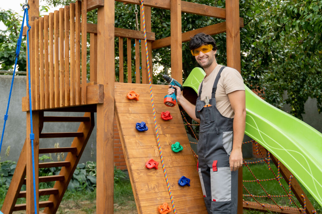 main with power tool by swing set