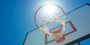 Sunlight shining through a basketball hoop